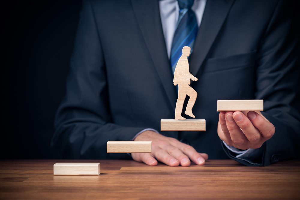 business partner coaching | stepping up on wooden blocks