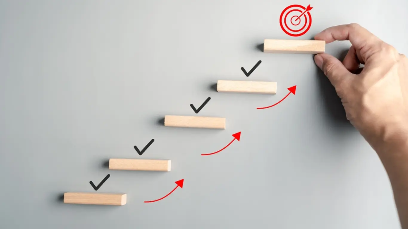 graphic demonstrating a chart with progress meeting the target at the top